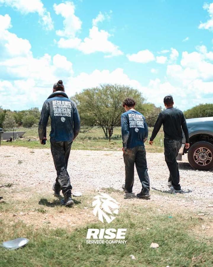Rise technicians walking to a job